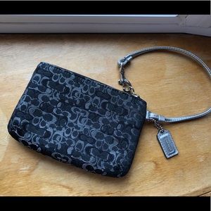 Coach wristlet. Signature print black and silver